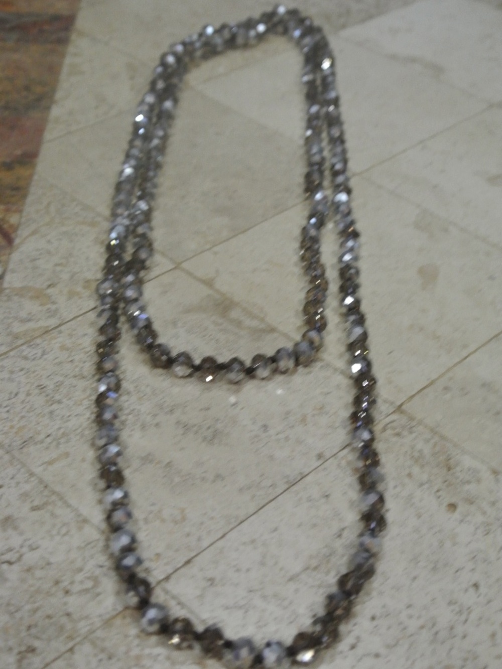 BROWN AND SILVER 29 INCH FACETED BEADED NECKLACE
